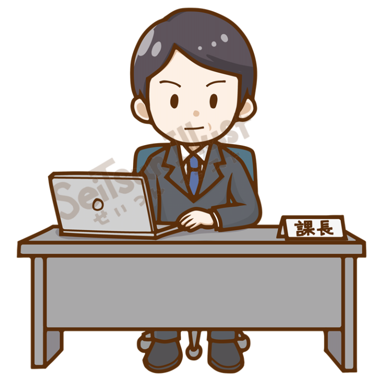 会社のデスクでノートパソコンを使う課長の男性
